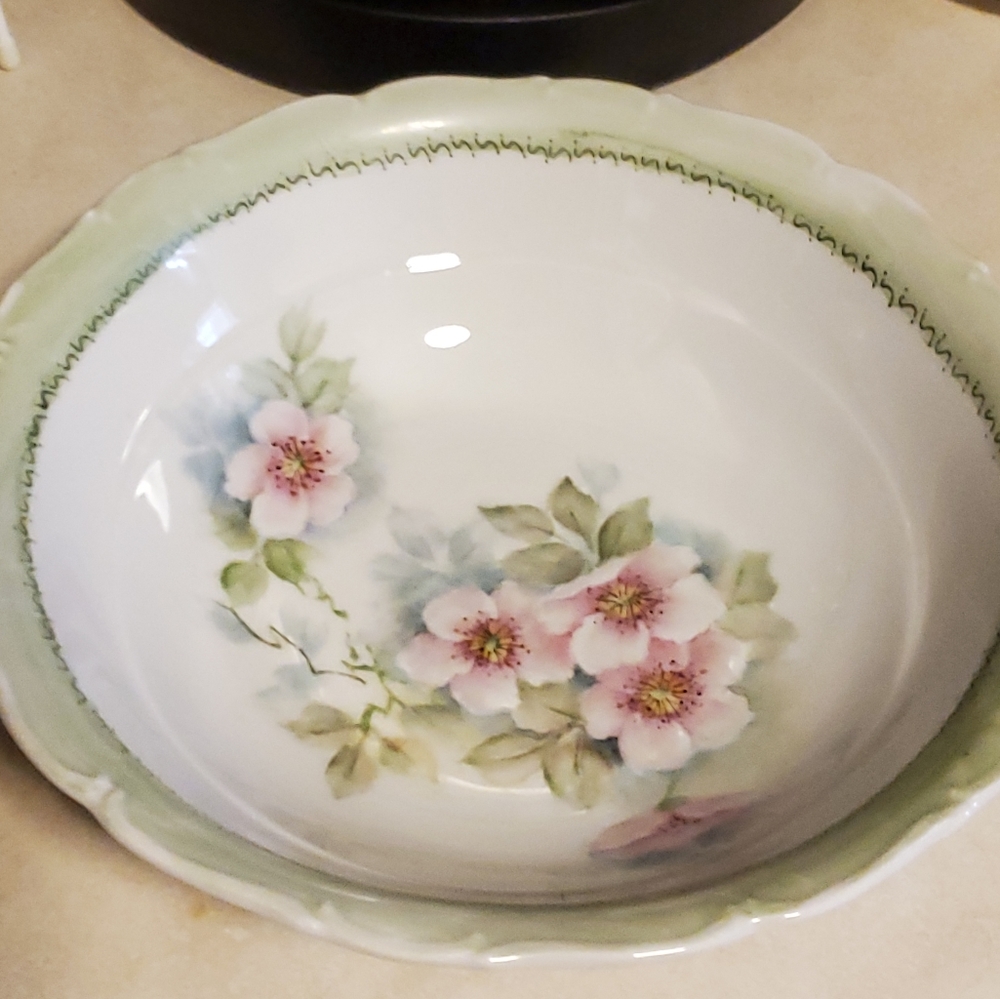 Vintage serving bowl with green rim and pink flowers